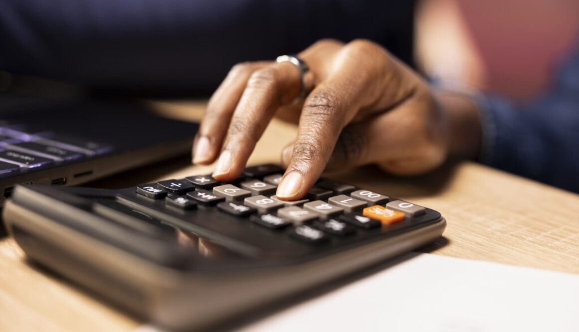 Black couple managing their self employed business finances and taxes